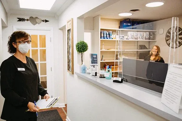 Office staff next to front desk